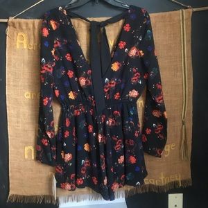 Floral and black, long sleeve GB romper.
